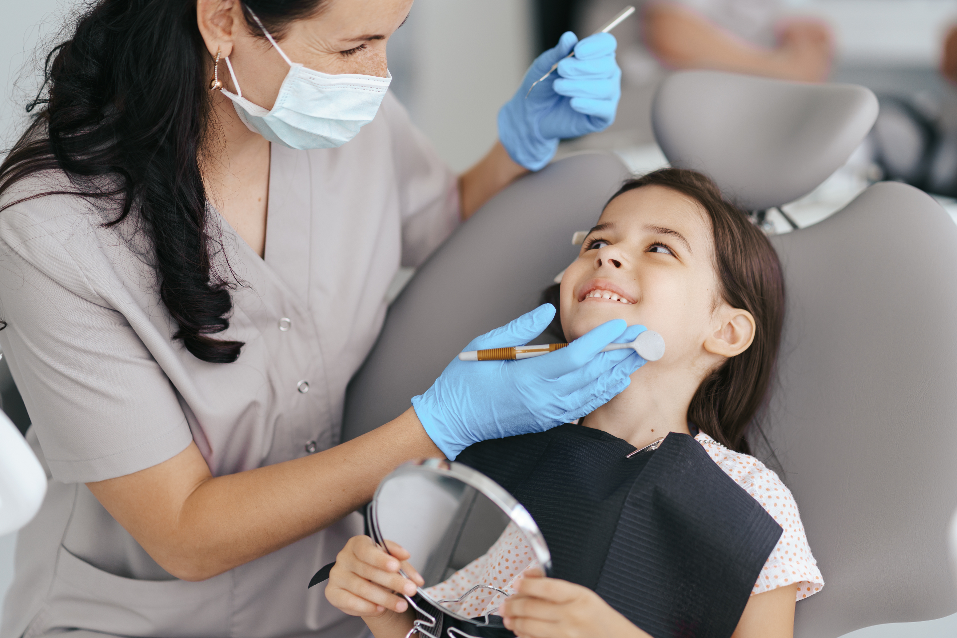 Young patient smiling at the dentist
